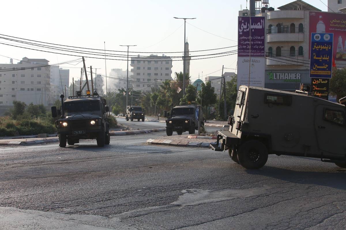 Military vehicles of Israeli forces move streets as Israeli forces conducted airstrikes and raid on the city of Jenin, West Bank on July 03, 2023 [Nedal Eshtayah - Anadolu Agency]