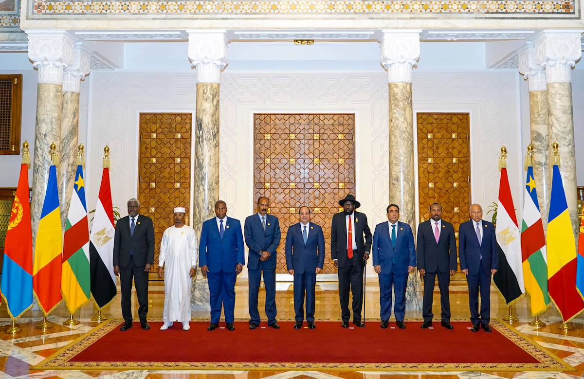 Egyptian President Abdel Fattah Al-Sisi (5th L), South Sudanese President Salva Kiir Mayardit (4th R), Chairman of the Presidential Council of Libya, Mohamed al-Menfi (3rd R), Ethiopian Prime Minister Abiy Ahmed Ali (2nd R), Secretary General of Arab League Ahmed Aboul Gheit (R), President of Eritrea Isaias Afewerki (4th L), President of the Central African Republic, Faustin-Archange Touadera (3rd L), Chad President Mahamat Idriss Deby (2nd L) and African Union (AU) Commission Chairman Moussa Faki (L) attend "Summit of Sudan's neighboring countries" meeting in Cairo, Egypt on July 13, 2023. [Presidential Council of Libya - Anadolu Agency]
