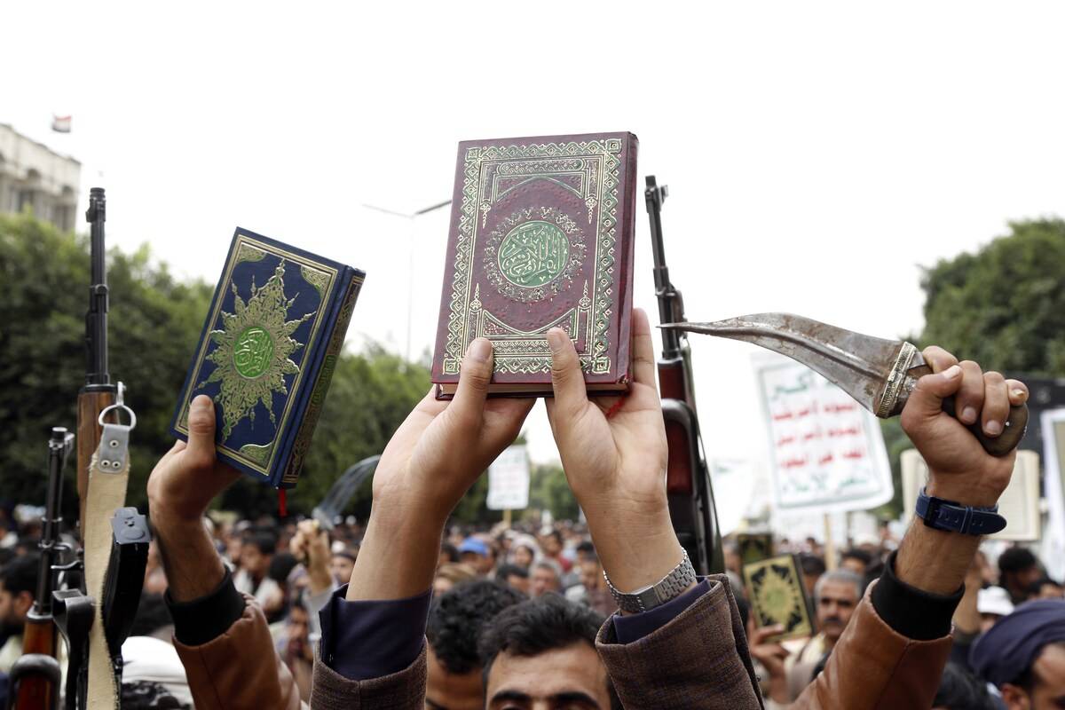 People take part in a protest against the burning of Holy Quran in Denmark and Sweden in Sanaa, Yemen on July 24, 2023. [Mohammed Hamoud - Anadolu Agency]