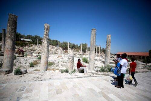 People visit Sebastia, which dates back 5 thousand years in Nablus, West Bank on July 30, 2023. [Issam Rimawi - Anadolu Agency]