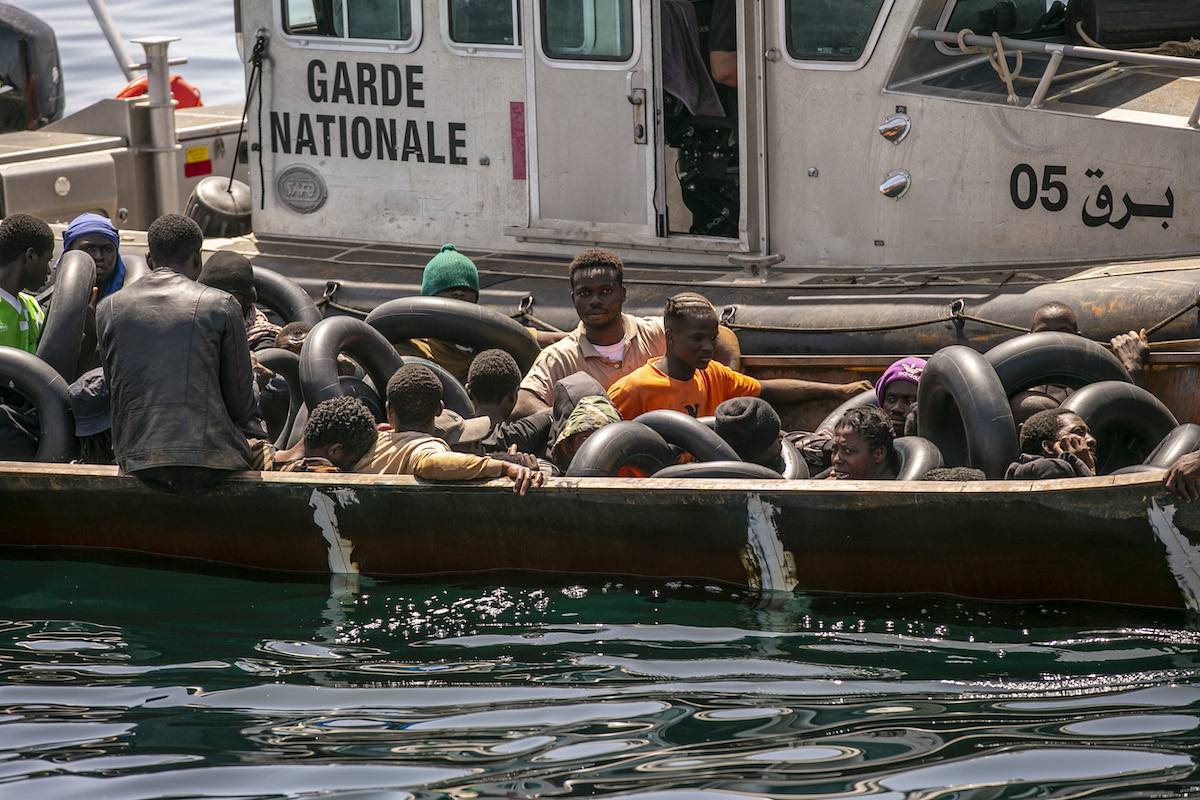 The Tunisian National Guard rescues irregular migrants off the city of Sfax as they try to make their way to Europe on 12 August 2023. [Yassine Gaidi - Anadolu Agency]