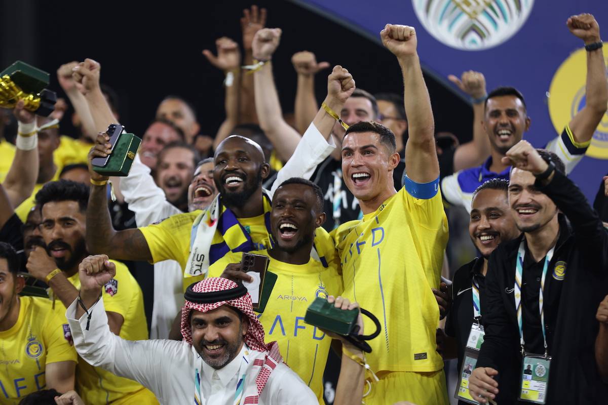 Cristiano Ronaldo of Al Nassr celebrates with teammates after the team's victory in the Arab Club Champions Cup final match between Al-Hilal and Al-Nassr at King Fahd Stadium, in Taif, Saudi Arabia on August 12, 2023. [Stringer - Anadolu Agency]