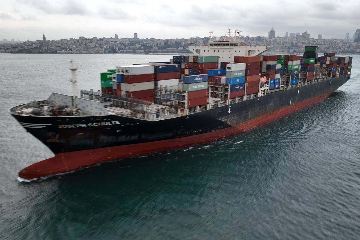 An aerial view of the container ship, named Joseph Schulte, which set sail from Ukraine's Odesa port earlier this week, reaches the Istanbul Strait in Istanbul, Turkiye on August 18, 2023. [Osman Bakır - Anadolu Agency]