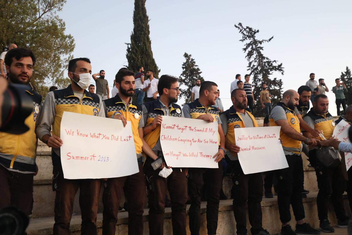 Syria Civil Defence (White Helmets) members gather to commemorate 10th anniversary of the Ghouta chemical attack, in Idlib, Syria on August 20, 2023 [İzzettin Kasım/Anadolu Agency]