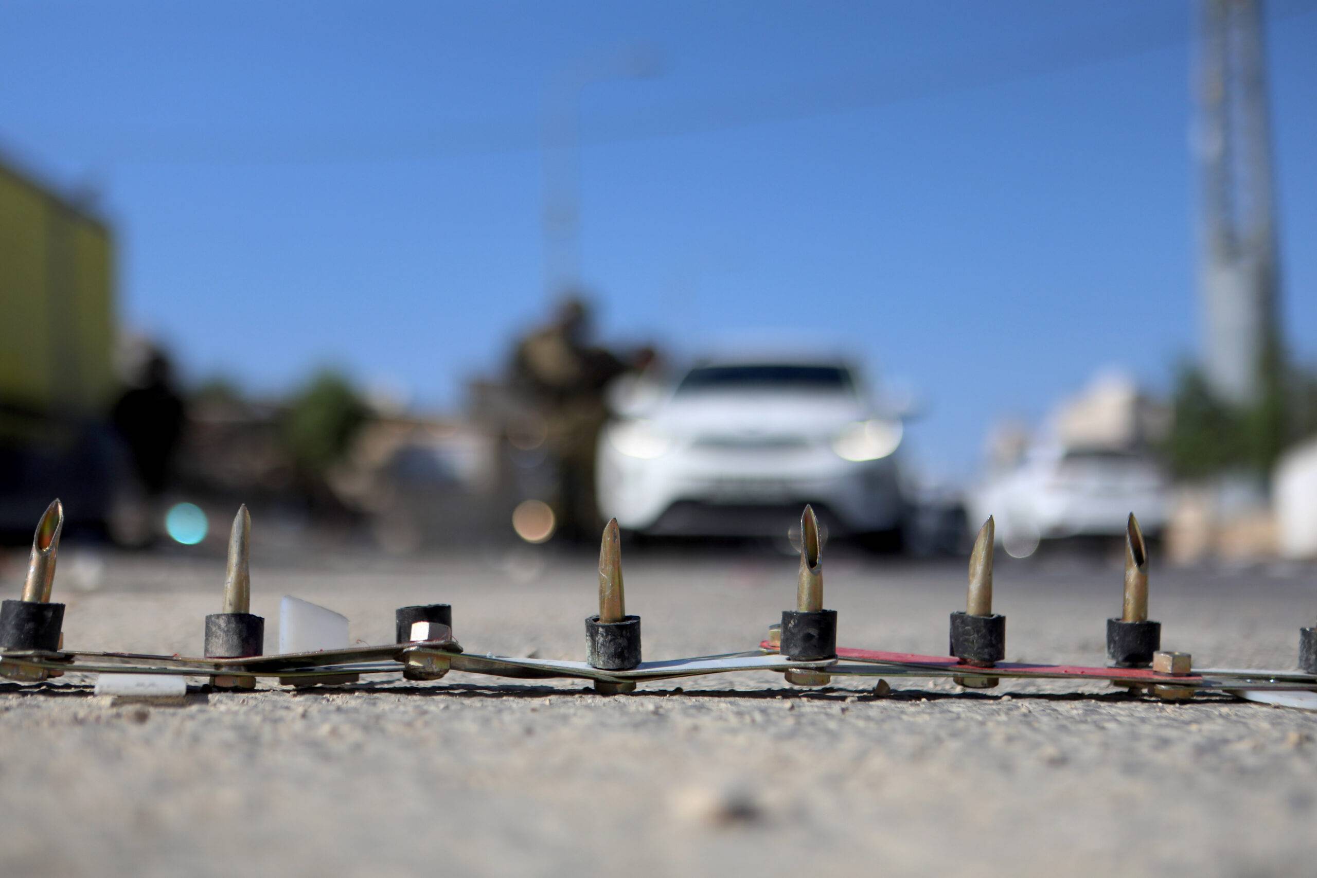 Spike barriers are seen as Israeli army close all entrances and exits to Al Khalil following the attack, in which one settler is killed and another injured, in Hebron, West Bank on August 22, 2023 [Mamoun Wazwaz/Anadolu Agency]