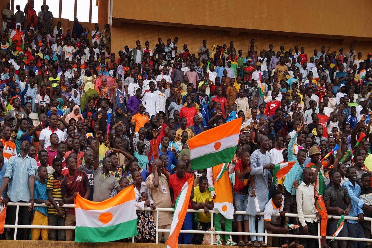 Coup supporters with Niger flags celebrate the one-month anniversary of the military takeover in Niger at the country's largest stadium, General Seyni Kountche, in Niamey, Niger on August 26, 2023 [Balima Boureima - Anadolu Agency]