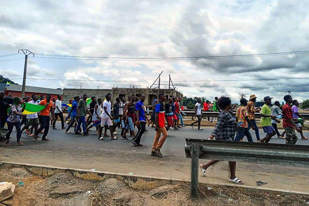 Supporters of the military administration gather on a street after Gabonese army officers enter the national television building following the announcement of the presidential election results and announce that they take over, in Libreville, Gabon on August 30, 2023 [Stringer - Anadolu Agency]