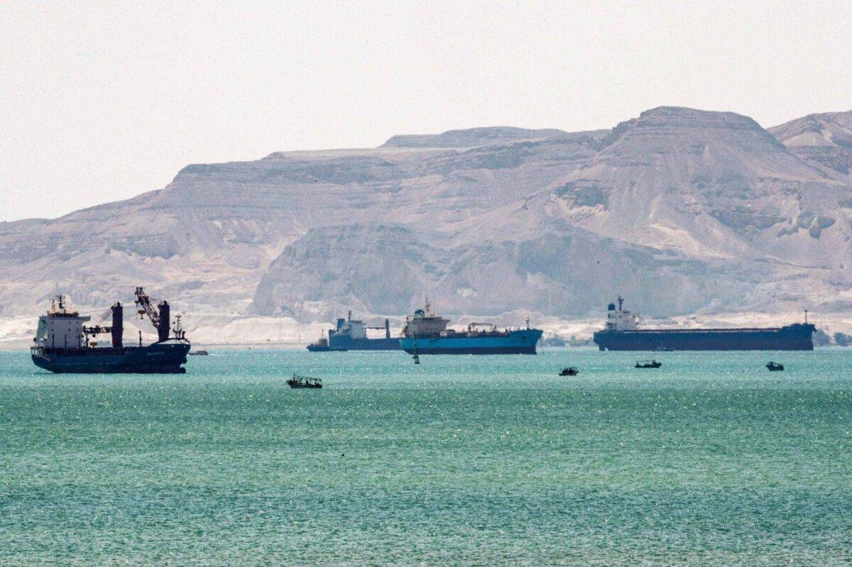 This picture taken on March 28, 2021 shows tanker and freight ships near the entrance of the Suez Canal, by Egypt's Red Sea port city of Suez [AHMED HASAN/AFP via Getty Images]