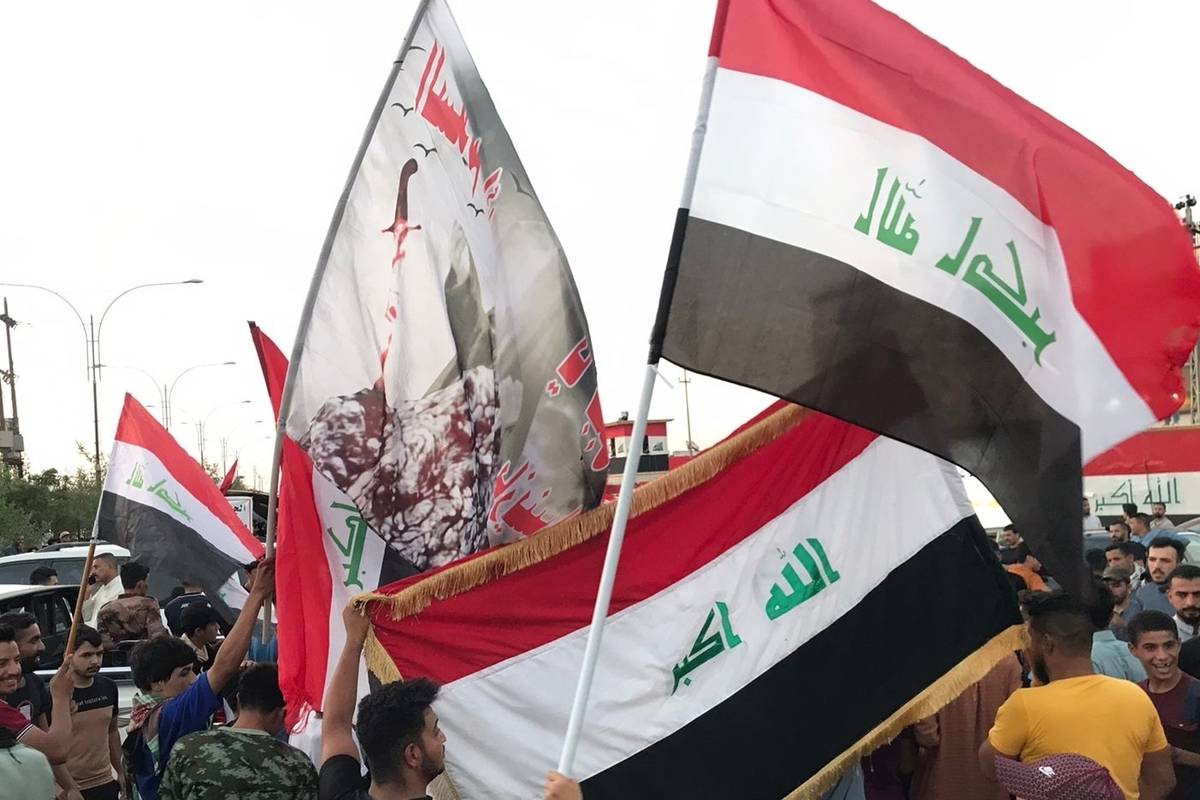 People gather to protest against the preparations to evacuate the main headquarters building of the Kirkuk Joint Operations Command of the army and transfer it to the KDP in Kirkuk, Iraq on August 31, 2023 [Ali Makram Ghareeb/Anadolu Agency]