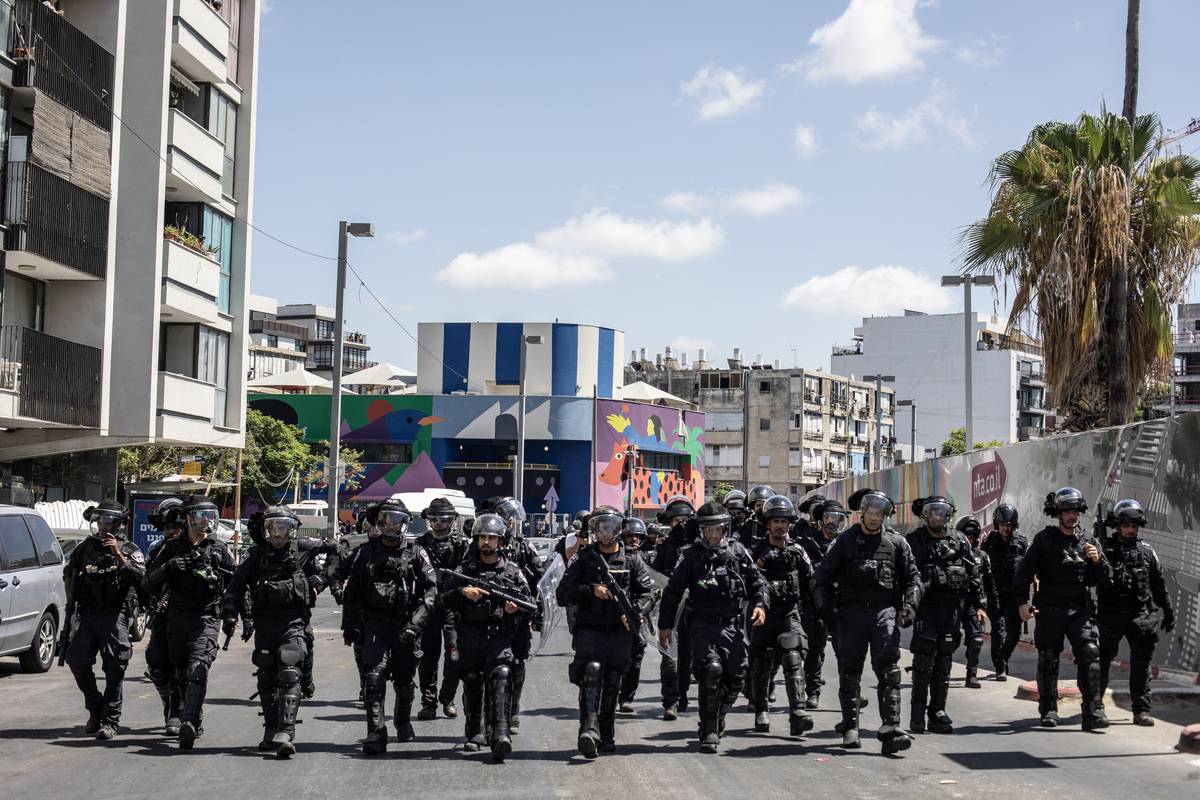 Israeli police intervene as Eritrean asylum seekers protest an event organized by the Eritrean Embassy by marching towards the embassy building in Tel Aviv, Israel on September 02, 2023 [Mustafa Alkharouf - Anadolu Agency]