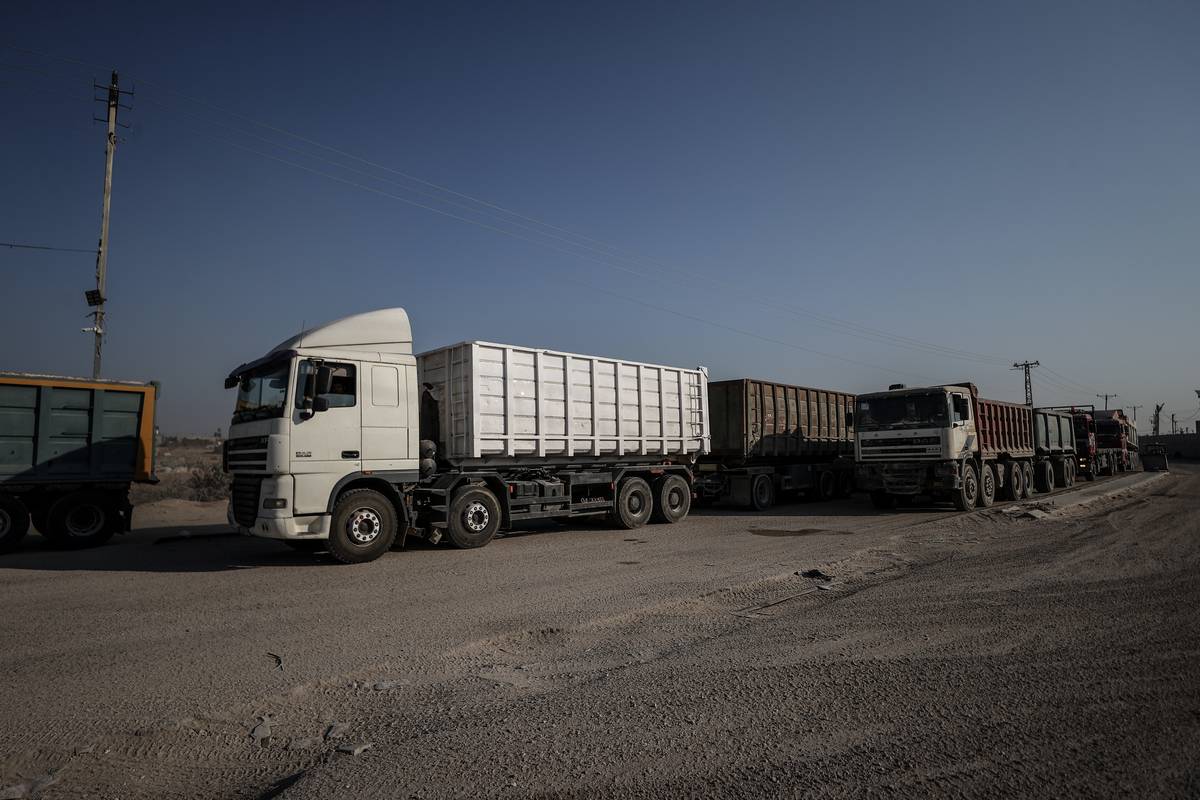Trucks are seen at the Kerem Shalom border crossing in Gaza City, Gaza on September 05, 2023. [Ali Jadallah - Anadolu Agency]