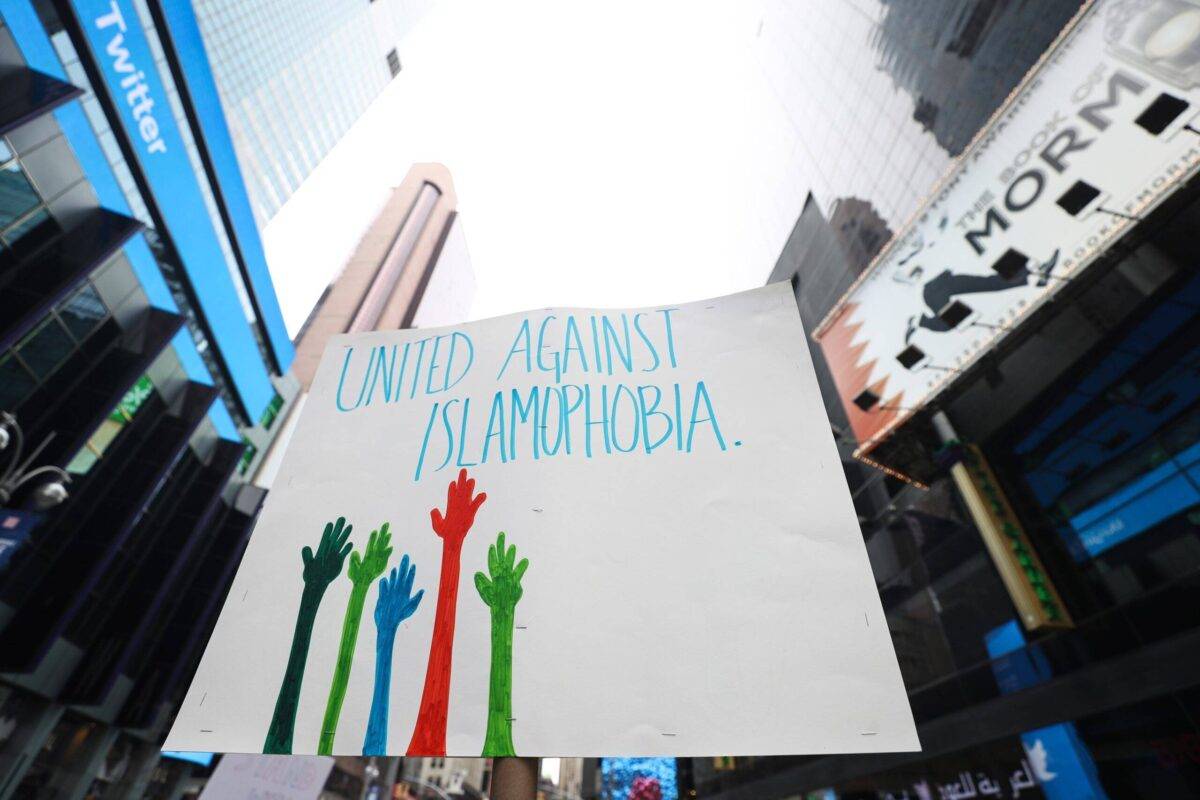 Demonstrators including Muslims, Christians and Jews take part in a protest against Islamophobia on Times Square in New York, United States, on 24 March, 2019 [Atilgan Ozdil/Anadolu Agency/Getty Images]