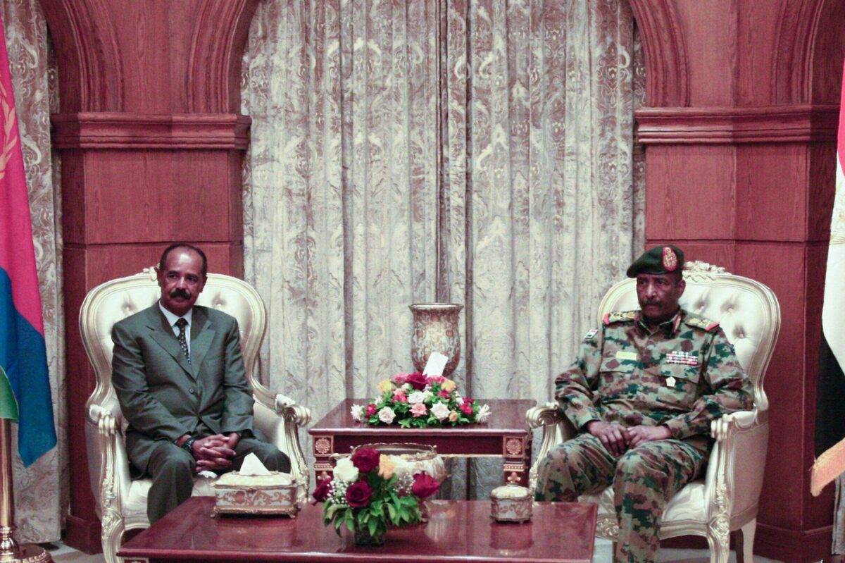 President of the Sudanese Transitional Council General Abdel Fattah al-Burhan (R) meets with Eritrean President Isaias Afwerki in the Sudanese capital Khartoum on September 14, 2019 [EBRAHIM HAMID/AFP via Getty Images]