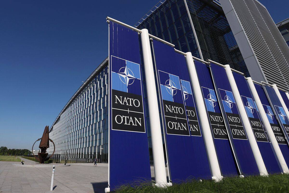 North Atlantic Treaty Organization (NATO) logos at the NATO headquarters in Brussels, Belgium. [VALERIA MONGELLI/AFP via Getty Images]