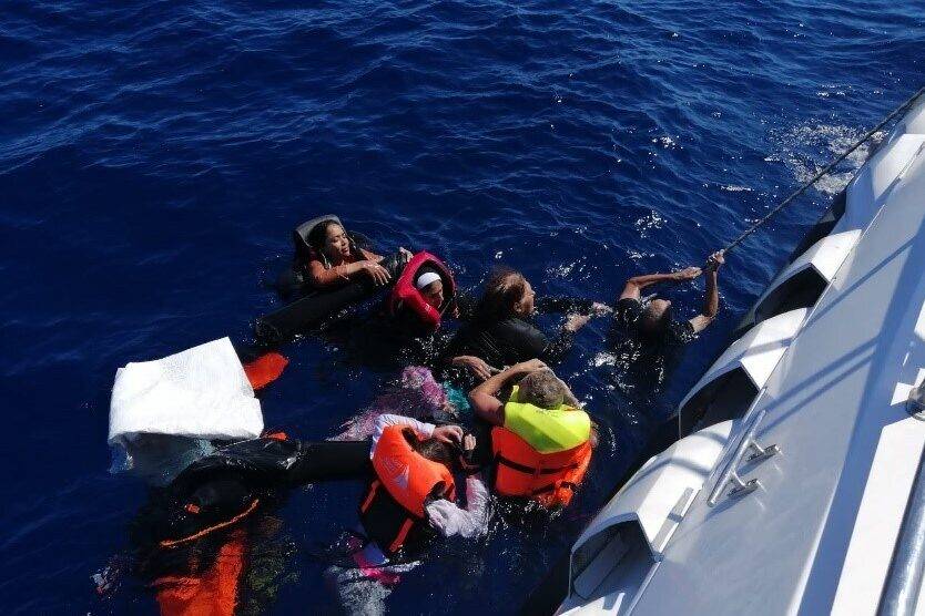 Turkish coast guards rescue irregular migrants who were illegally pushed back into Turkiye territorial waters by Greek forces off the coast of Mugla, Turkiye on September 03, 2022 [Turkish Coast Guard Command/Handout/Anadolu Agency via Getty Images]