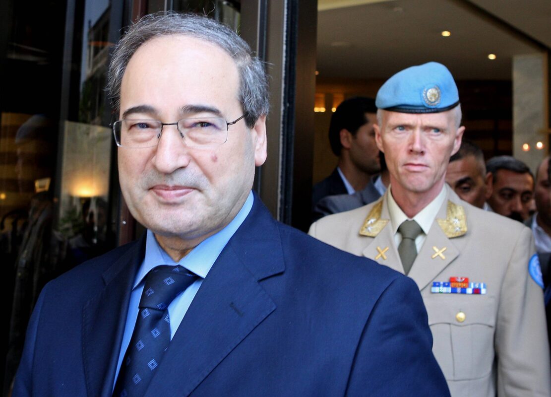 Syria's Deputy Foreign Minister Faisal al-Miqdad (L) in Damascus on June 5, 2012 [LOUAI BESHARA/AFP/GettyImages]