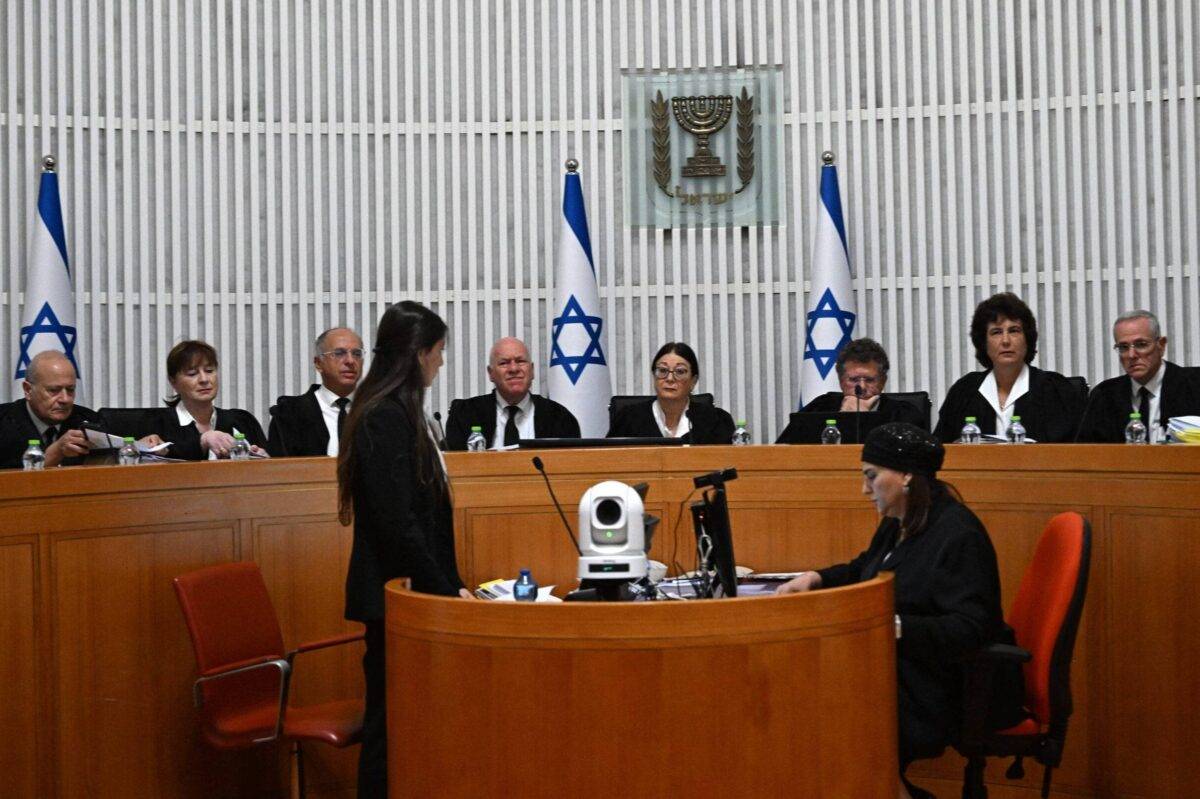 President of the Israeli Supreme Court Esther Hayut and all fifteen judges assemble to hear petitions against the 'reasonableness clause' at the court premises in Jerusalem, on September 12, 2023 [DEBBIE HILL/POOL/AFP via Getty Images]