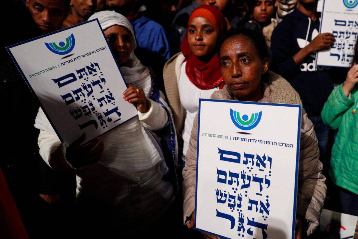 African migrants during a demonstration in the Israeli coastal city of Tel Aviv on February 24, 2018 [JACK GUEZ/AFP via Getty Images]