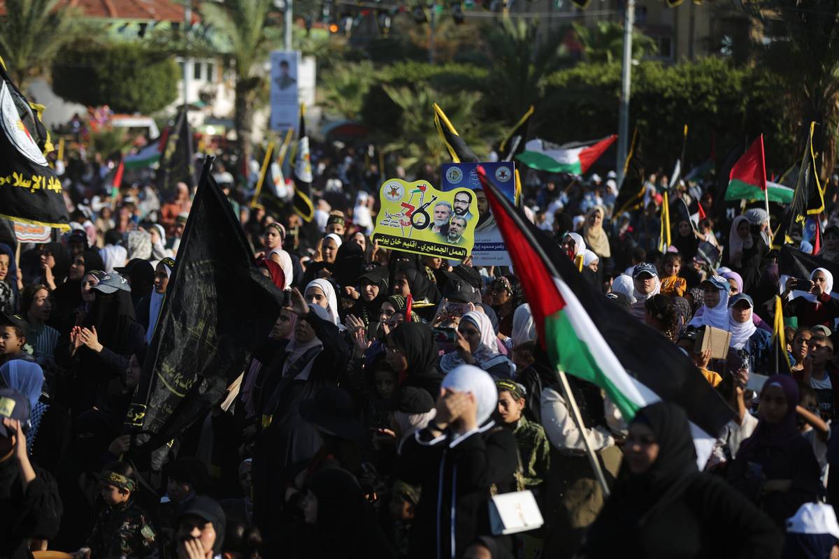Palestinians along with Al-Quds Brigades, the movement's armed wing, attend a parade to mark 36th anniversary of the founding of Palestinian Islamic Jihad (PIJ) Movement in Gaza City, Gaza on October 06, 2023. [Ali Jadallah - Anadolu Agency]