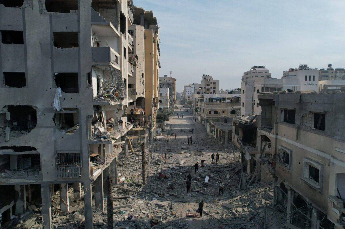 An aerial view of destroyed buildings and debris at the Al-Karama neighborhood after an Israeli airstrike that has been going on for five days in Gaza City, Gaza on October 11, 2023 [Stringer/Anadolu Agency]