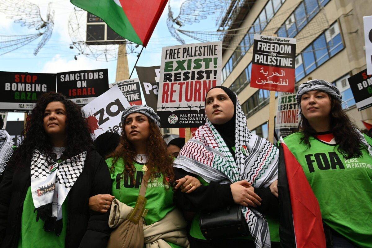 People waving Palestinian flags, gather to stage a demonstration to support Palestinians and condemn the Israel's attack, in London, United Kingdom on October 14, 2023 [Kate Green/Anadolu Agency]