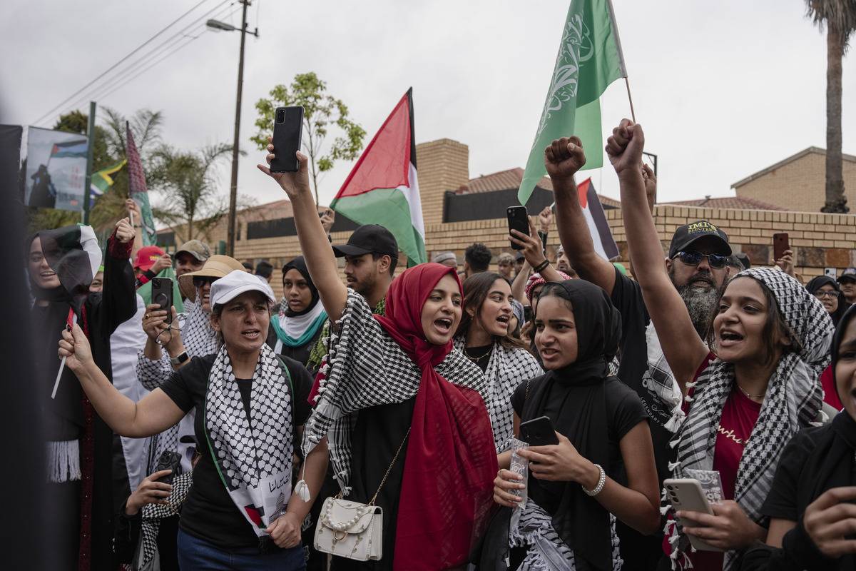 People hold a rally and march in support of Palestinians in Johannesburg, South Africa on October 15, 2023. [Ihsaan Haffejee - Anadolu Agency]