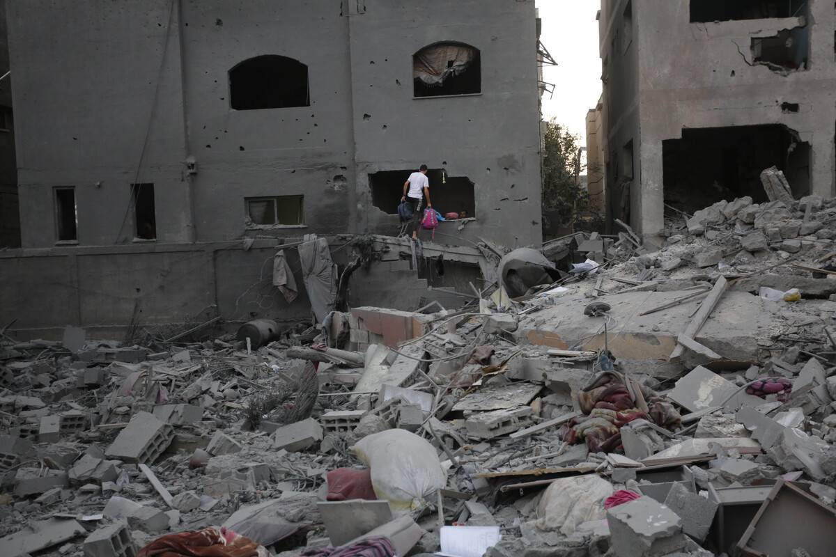 Buildings are destroyed at Nuseirat Refugee Camp after Israeli airstrikes in Deir al Balah, Gaza on October 16, 2023 [Ashraf Amra - Anadolu Agency]