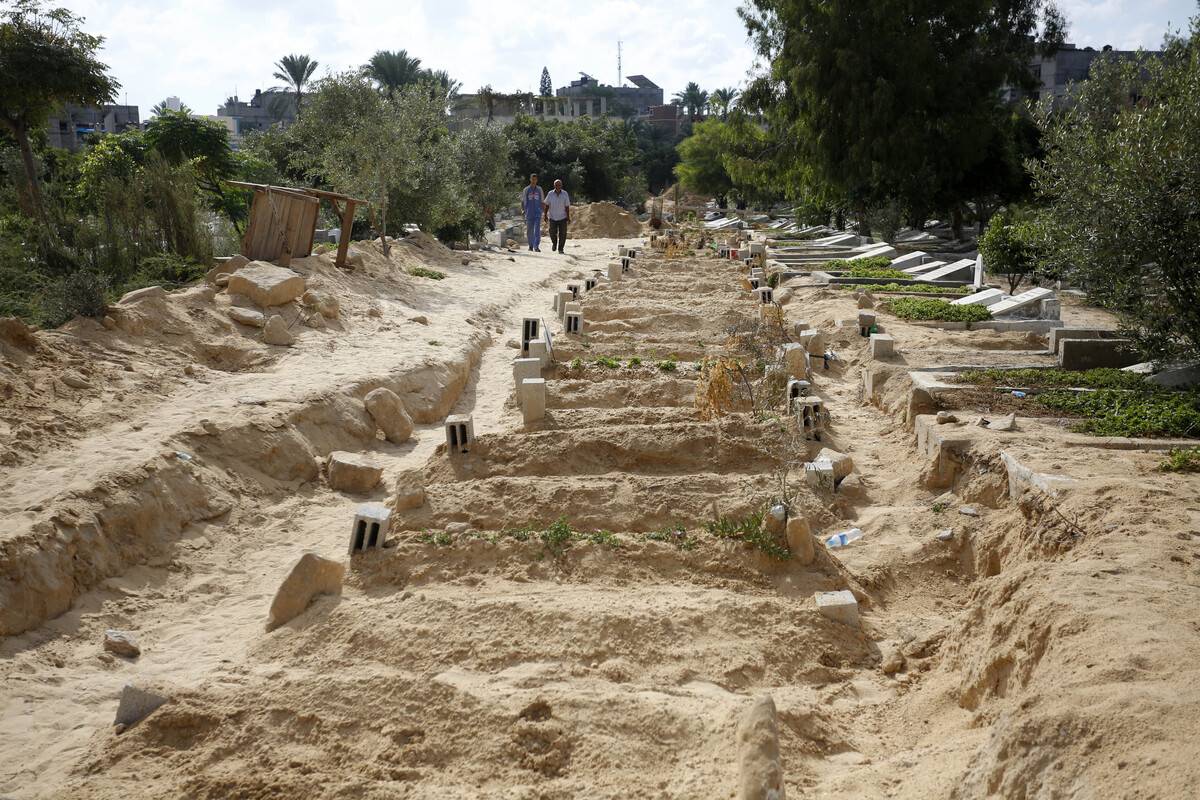 Palestinians attend the funeral prayer of the Palestinians who died during the Israeli airstrikes in Dair Al-Balah, Gaza on October 17, 2023. [Ashraf Amra - Anadolu Agency]