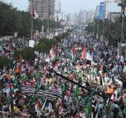 Hundreds of the Muttahida Qaumi Movement - Pakistan supporters hold banners and Palestinian flags as they attend a demonstration in support of Palestinians, in Karachi, Pakistan on October 20, 2023. [Sabir Mazhar - Anadolu Agency]
