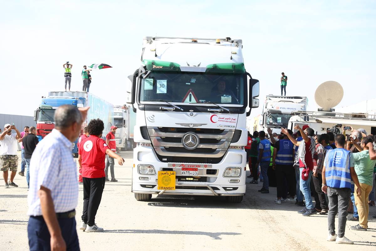 First convoy of relief trucks begins to enter the Gaza Strip from the Egyptian side of the Rafah crossing, in Rafah, Gaza on October 21, 2023. [Stringer - Anadolu Agency]