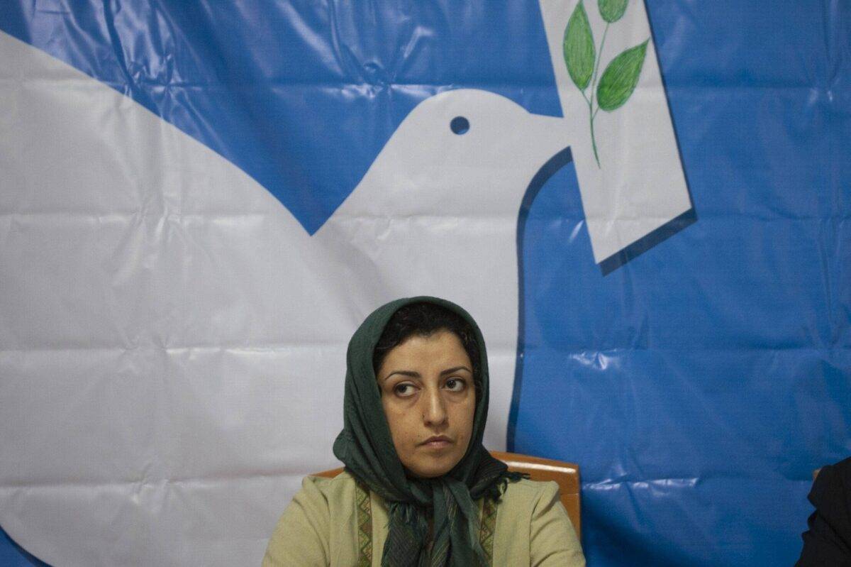 Iranian female human rights activist, Narges Mohammadi, looks on while attending a session in the former office of the Defenders of Human Rights Association in central Tehran, Iran on November 19, 2007 [Morteza Nikoubazl/NurPhoto via Getty Images]