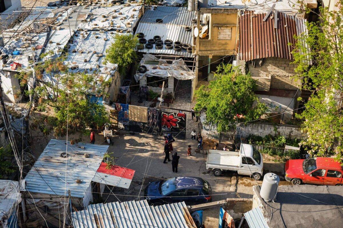 An elevated view of shacks where multiple marginalised families reside in Lebanon on April 14, 2021 [IBRAHIM CHALHOUB/AFP via Getty Images]
