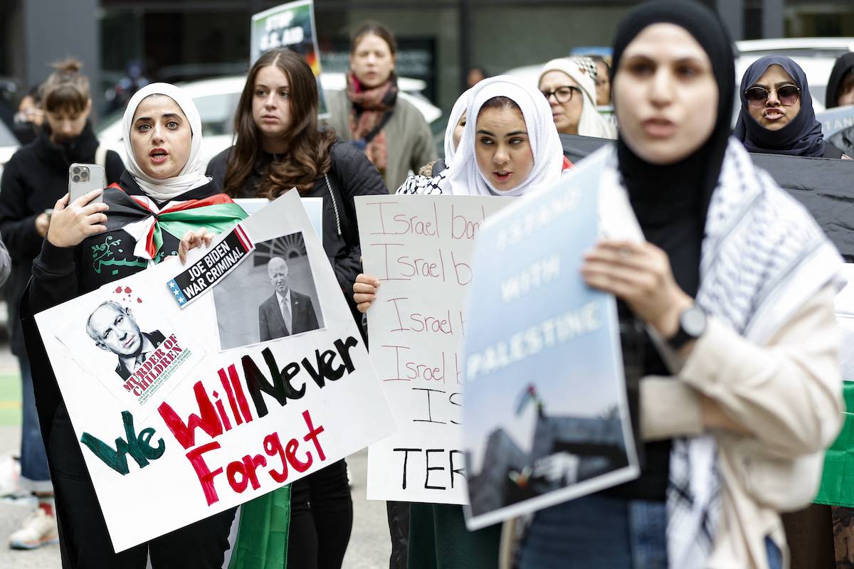 Demonstrators rally to show support for the Palestinian people following the Gaza City hospital blast, on October 18, 2023, in Chicago. [KAMIL KRZACZYNSKI/AFP via Getty Images]
