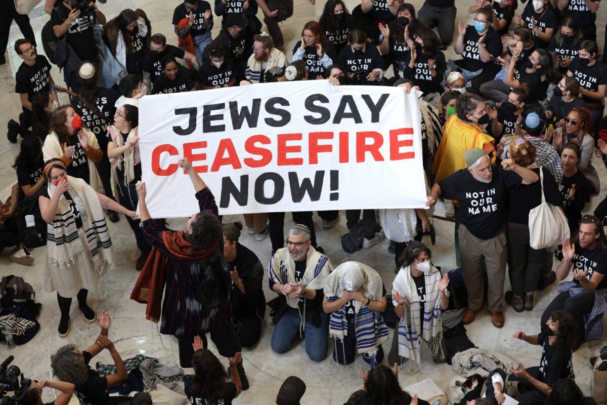 Members of the Jewish Voice for Peace and the IfNotNow movement staged a rally to call for a cease fire in the Israel–Hamas war in Gaza, at the Cannon House Office in Washington, DC Building on October 18, 2023 [Alex Wong/Getty Images]