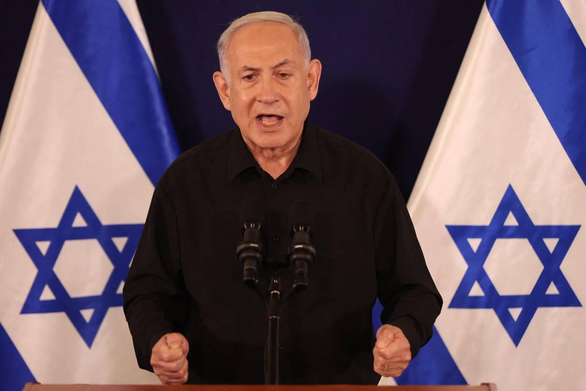 Israeli Prime Minister Benjamin Netanyahu speaks during a press conference in the Kirya military base in Tel Aviv on October 28, 2023. [Photo by ABIR SULTAN/POOL/AFP via Getty Images]