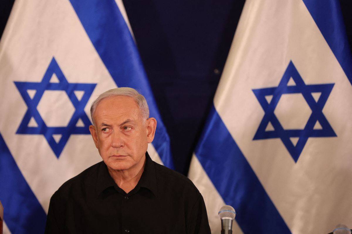Israeli Prime Minister Benjamin Netanyahu attends a press conference in the Kirya military base in Tel Aviv on October 28, 2023 amid ongoing battles between Israel and the Palestinian group Hamas. [ABIR SULTAN/POOL/AFP via Getty Images]