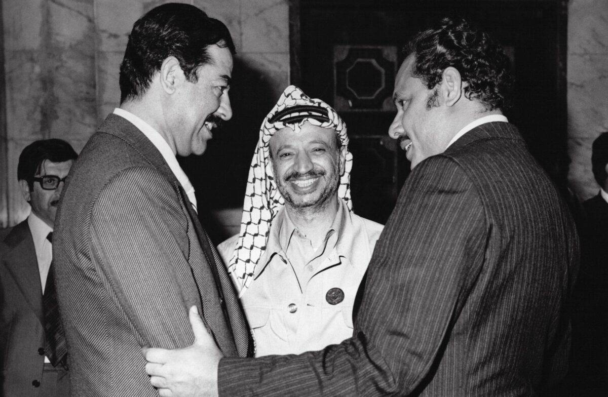 Saddam Hussein, Yasser Arafat and Ali Nasser Muhammad in Baghdad on November 3-5, 1978, Iraq. [Alain MINGAM/Gamma-Rapho via Getty Images]