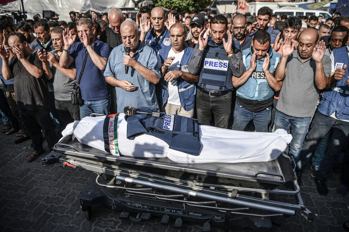 A funeral ceremony is held for Palestine TV correspondent Mohammed Abu Hatab, was killed, along with his family members, in an airstrike on his home in Khan Yunis, Gaza on November 03, 2023. [Abed Zagout - Anadolu Agency]