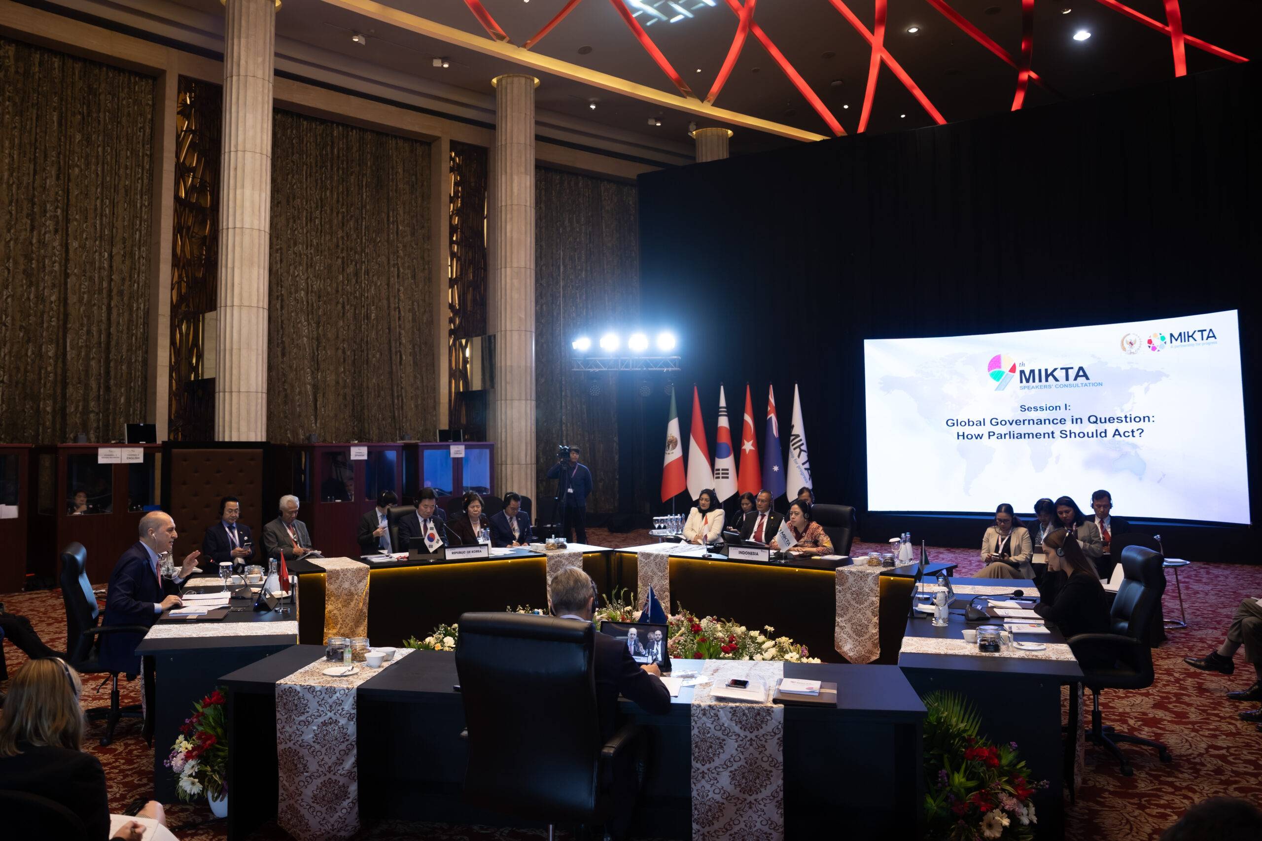 Turkish Parliament Speaker Numan Kurtulmus speaks at the first session of the 9th Meeting of Parliament Speakers of MIKTA titled "Global Governance in Question: How Parliament Should Act?" in Jakarta, Indonesia on November 20, 2023 [Turkish Grand National Assembly - Anadolu Agency]