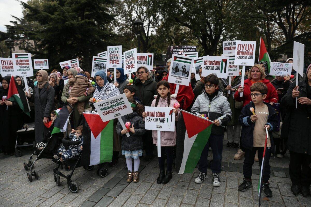 Volunteers of Children of the Earth Association, mostly woman and children gather at the Sultanahmet Square to show their support of the Palestinian children, while they chant slogans that read ''Children are dying, the world remains silent'', in Istanbul, Turkiye on November 20, 2023 [Hakan Akgün - Anadolu Agency]