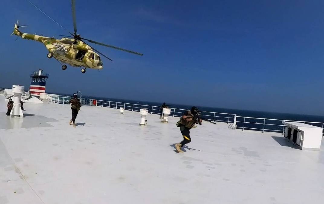 A screen grab captured from a video shows that cargo ship "Galaxy Leader", co-owned by an Israeli company, being hijacked by Iran-backed Houthis from Yemen in the Red Sea on November 20, 2023. [Houthis Media Center - Anadolu Agency]