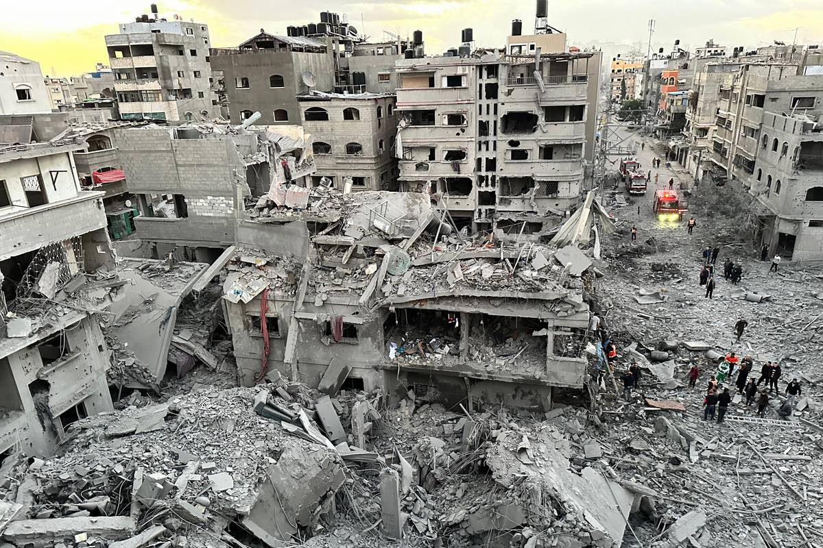 A view of collapsed, heavily damaged buildings after an Israeli airstrike on Beit Lahia town of Gaza on November 21, 2023. [Abdulqader Sabbah - Anadolu Agency]