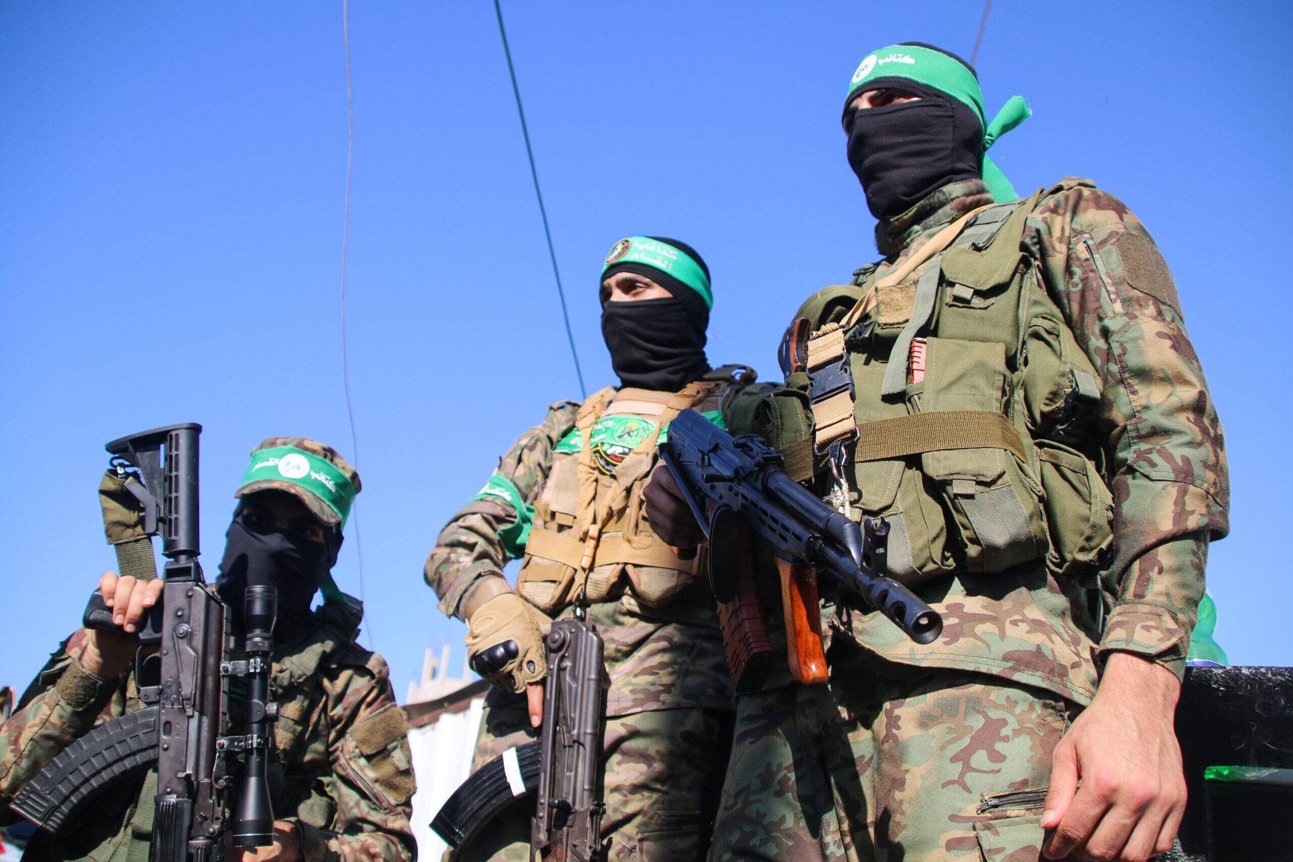 Fighters of the Izz al-Din al-Qassam Brigades, the military wing of Hamas, display their combat weapons in Maghazi camp July 19, 2023 [Ahmed Hasaballah/Getty Images]