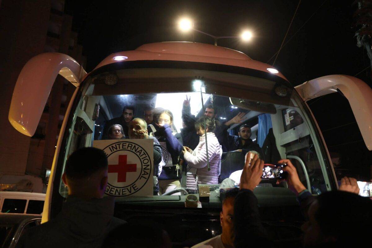 Palestinian hostages released from Israeli jails arrive in Beitunia, West Bank by a bus belonging to the International Committee of the Red Cross (ICRC) on November 30, 2023 [Issam Rimawi/Anadolu Agency]