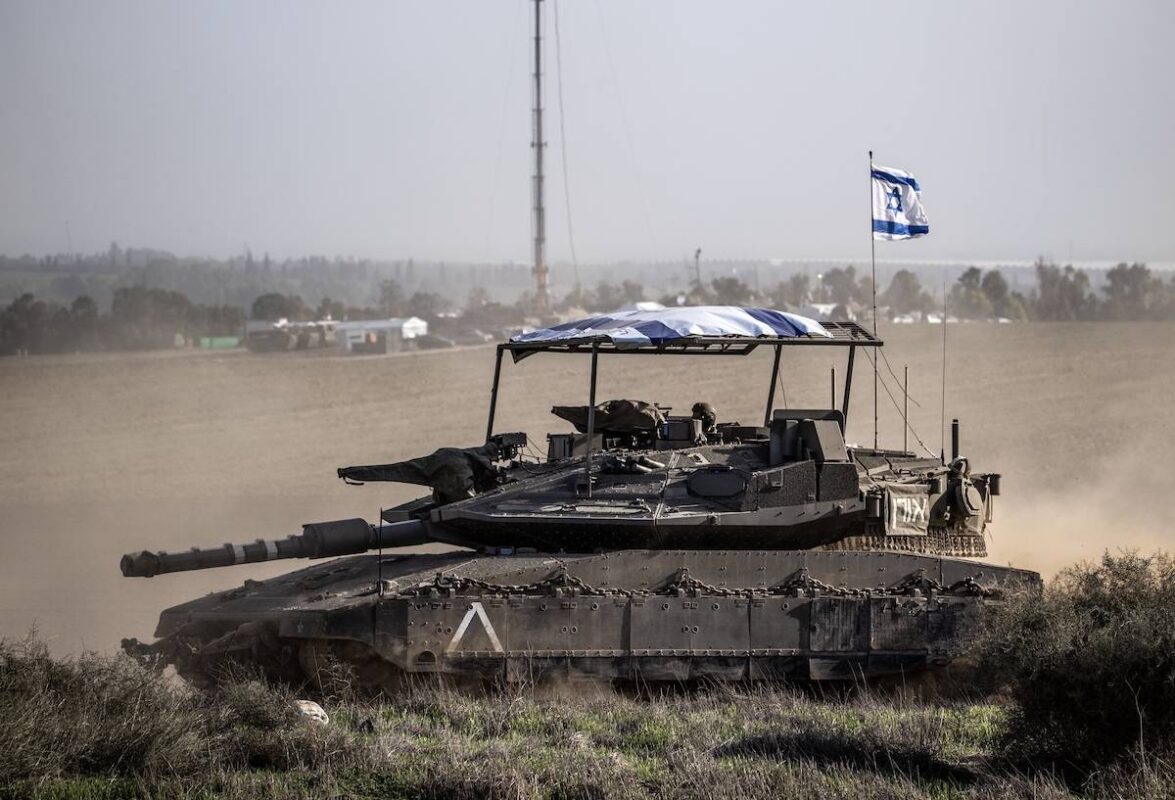 Israeli tanks, howitzers and armored vehicles are seen as Israeli Forces resume deploy soldiers, tanks and armored vehicles near the Gaza border in Sderot, Israel on December 02, 2023. [Mostafa Alkharouf - Anadolu Agency]