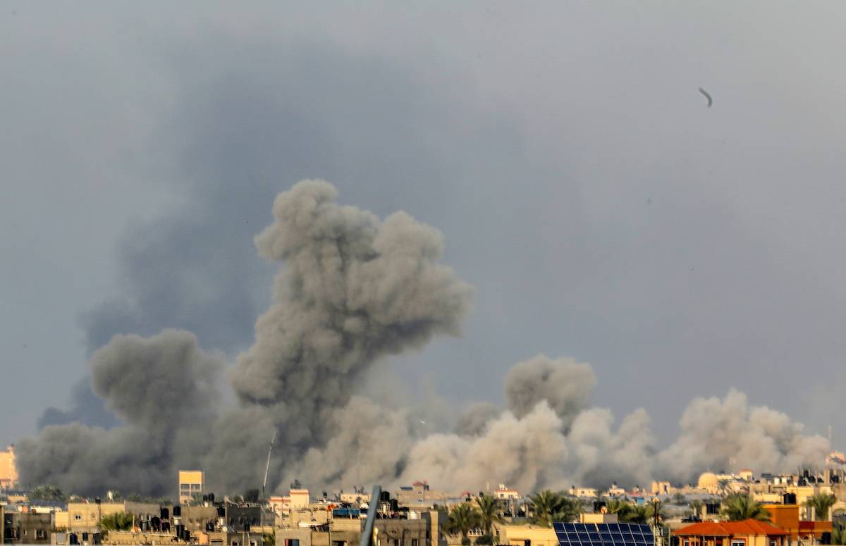 Smoke rises from the destroyed buildings as the Israeli attacks continue in Rafah, Gaza on December 07, 2023. [Abed Rahim Khatib - Anadolu Agency]