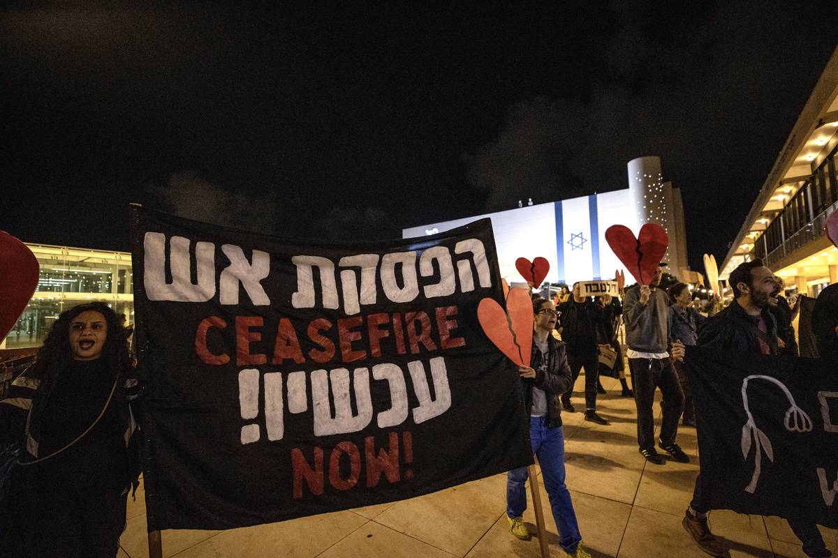 Israeli activists stage a demonstration in Tel Aviv, Israel, demanding an immediate ceasefire in Gaza under Israeli attack, on December 09, 2023 [Mostafa Alkharouf/Anadolu Agency]