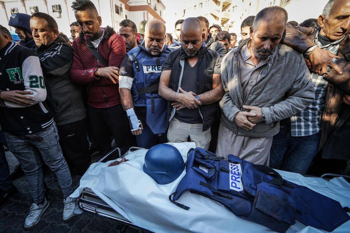 Al Jazeera correspondent Wail al-Dahduh (3rd L) also attends the funeral ceremony of Al Jazeera cameraman Samir Abu Dhaka, who died in the Israeli attacks in Khan Yunis, Gaza on December 16, 2023. [Belal Khaled - Anadolu Agency]