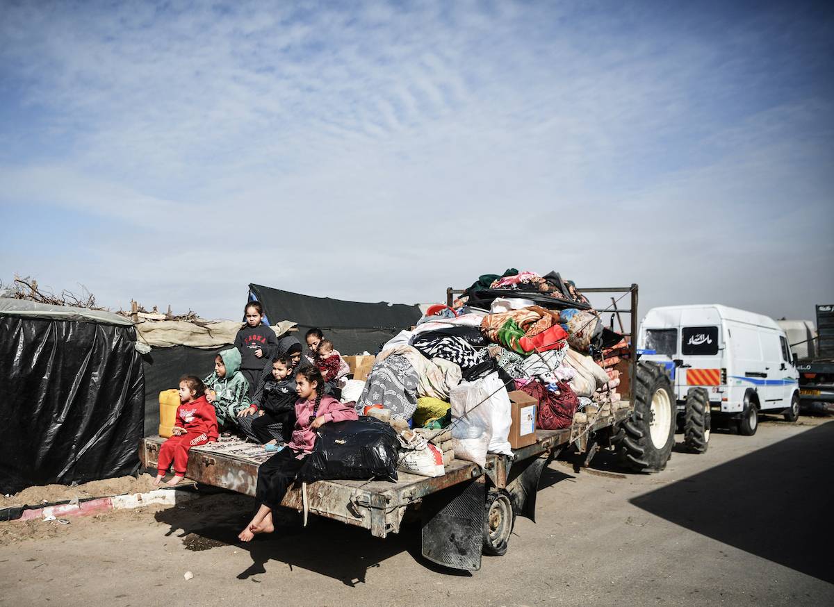 Palestinian Hudair family members on their way to Rafah hoping to find safer place after migrating from Nuseirat due to intense Israeli attacks on Gaza Strip on December 23, 2023. [Abed Zagout - Anadolu Agency]