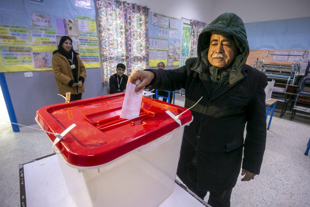 A citizen is seen voting at a local polling station for the first round of elections for the new "Local and Regional National Council" in Tunis, Tunisia on December 24, 2023 [Yassine Gaidi/Anadolu Agency]